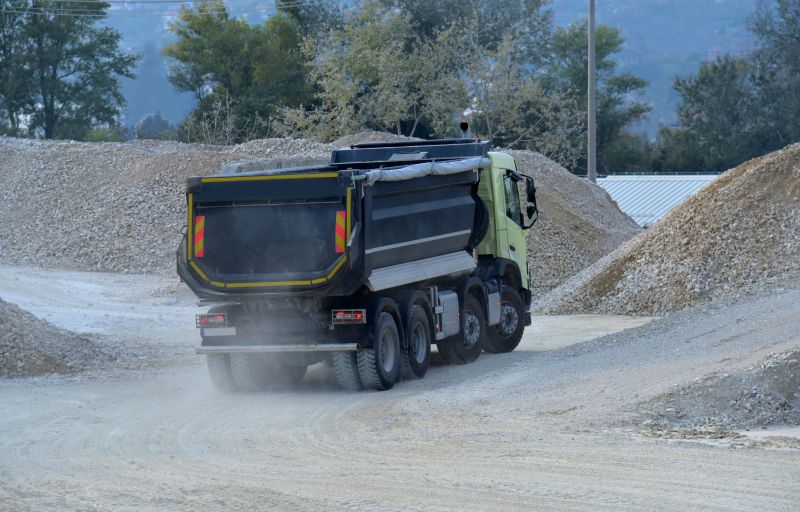 Delivery Trucks Loading Gravel